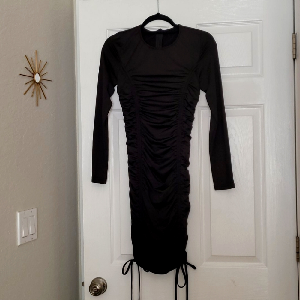 Long sleeved black ruched dress